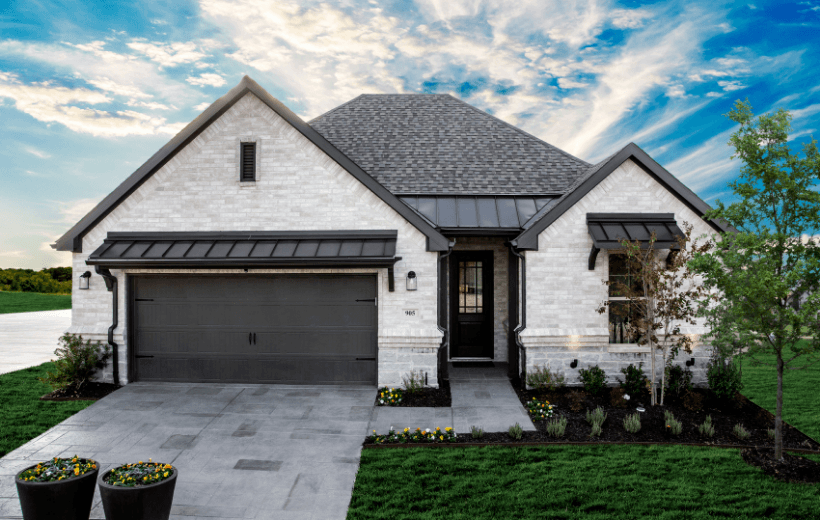 white and black house in ladera texas community