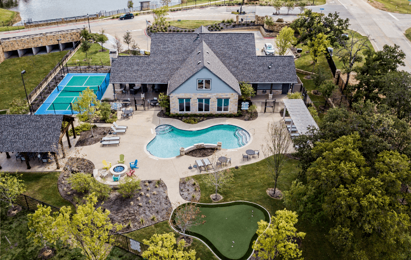 ladera texas active adult communities clubhouse, pool, and tennis court