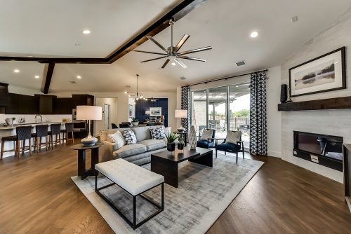 living room with kitchen in background