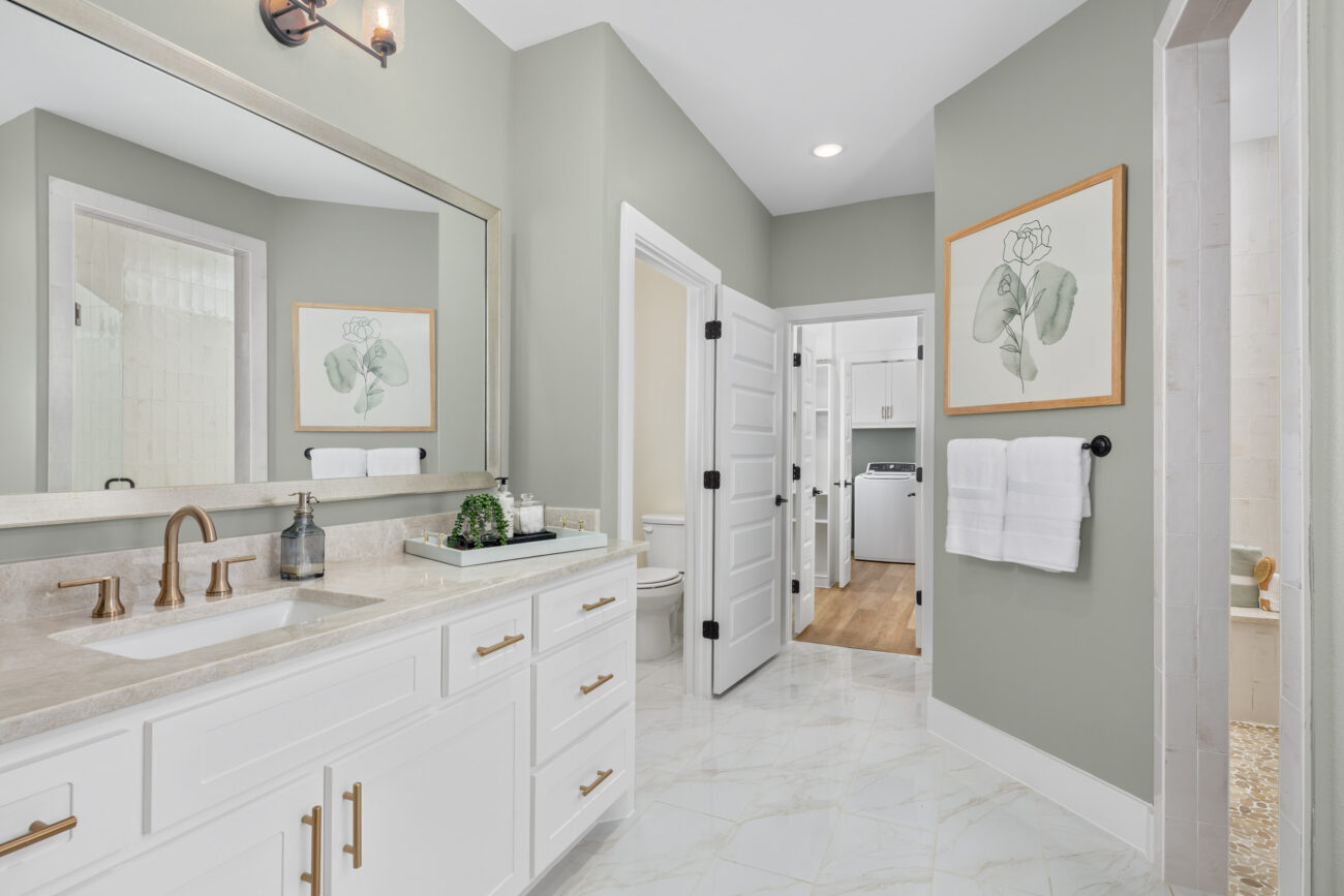 White and gray primary bath in Ladera Torino