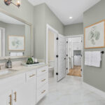 White and gray primary bath in Ladera Torino