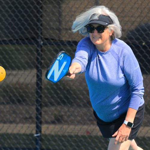 woman playing pickleball