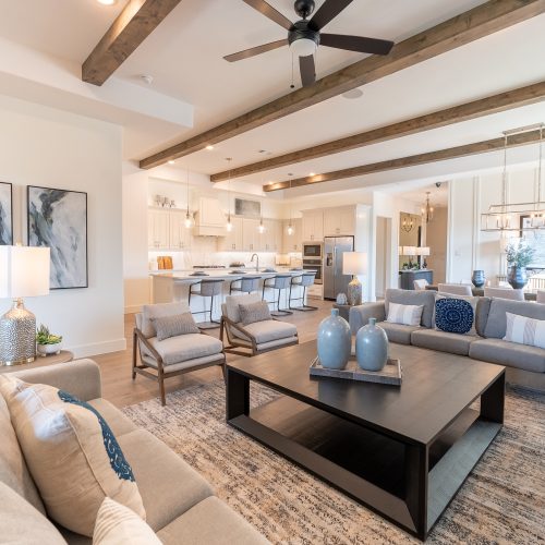 living room with kitchen in background