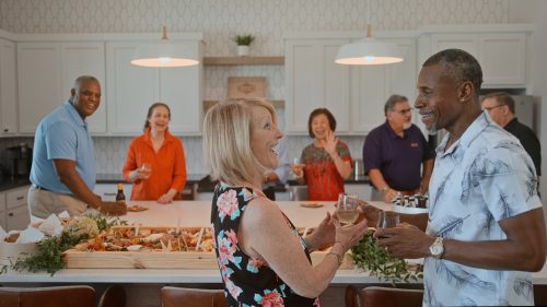 people gathering in community kitchen