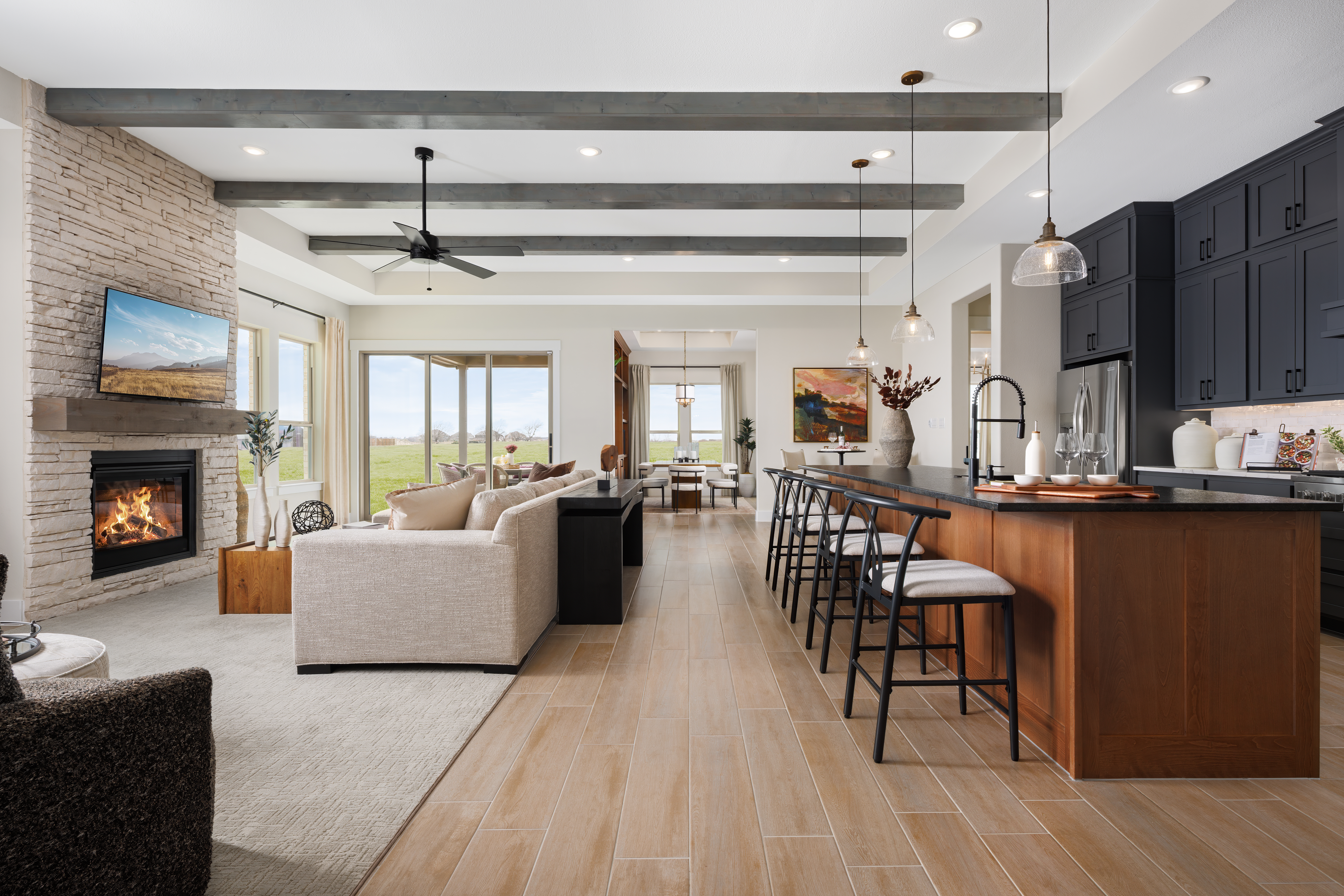 Ladera at Timberbrook Castella model home showing living room and kitchen | You'll Love Living in Ladera